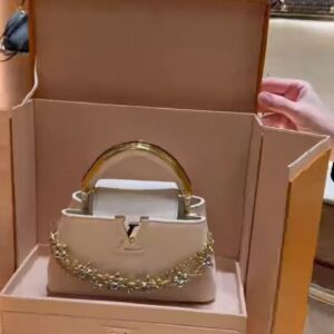 Elegant Mini Top-Handle Handbag with Decorative Chain