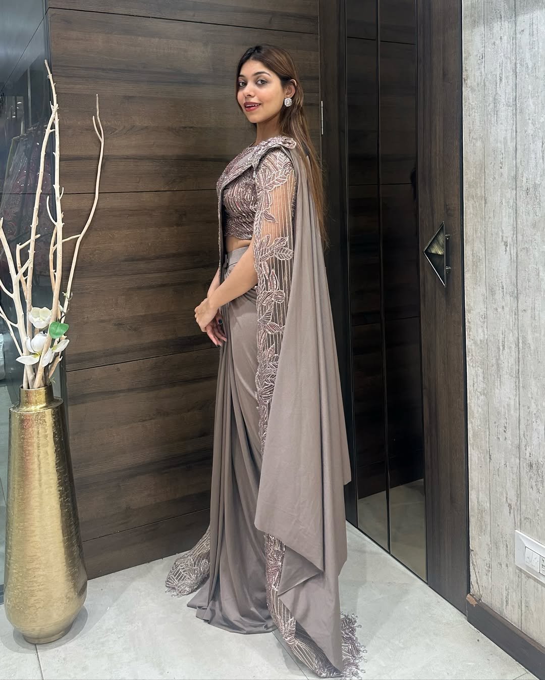 Designer Satin Drape Saree with Embellished Cape Blouse - Image 2