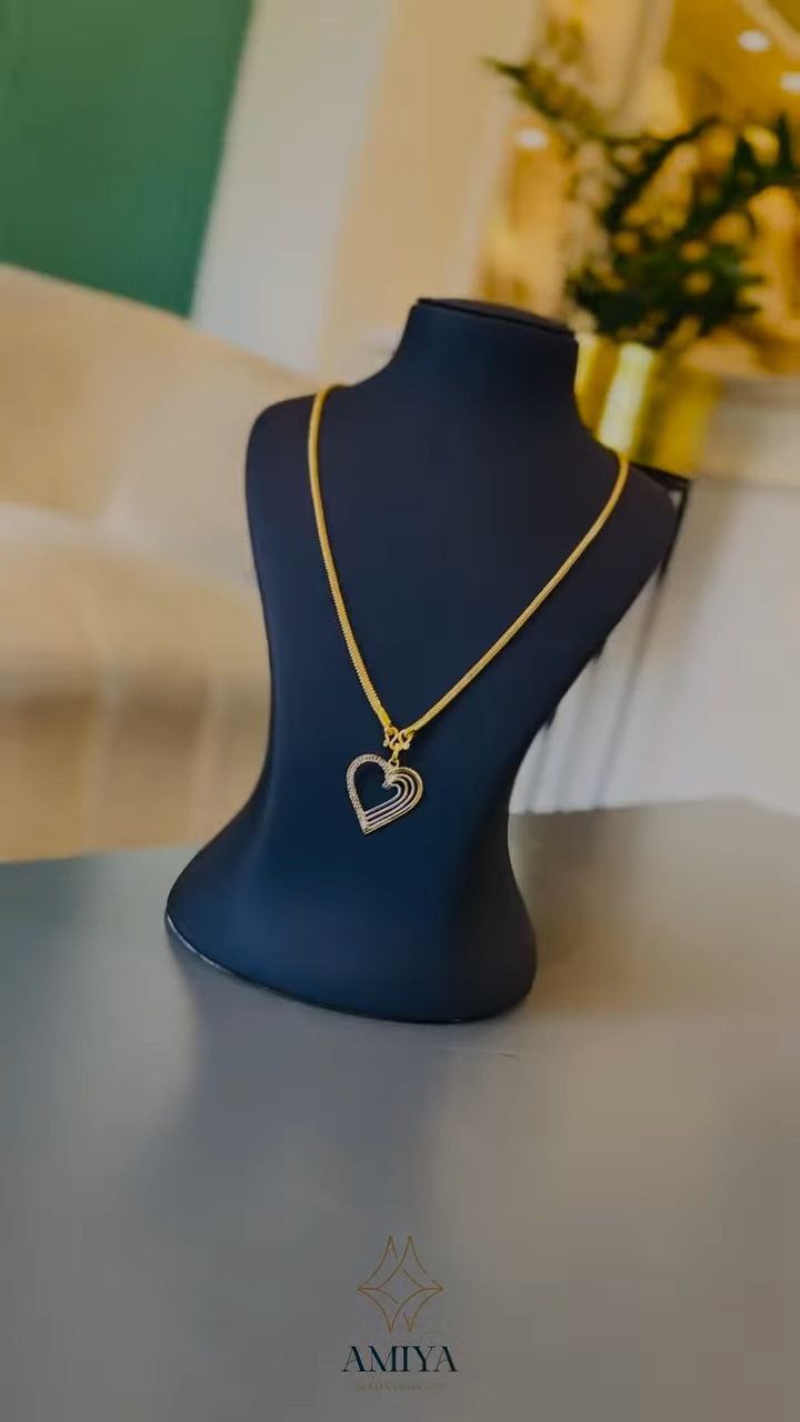 Minimal Gold-Tone Circular Pendant Necklace with Beaded Accents - Image 2