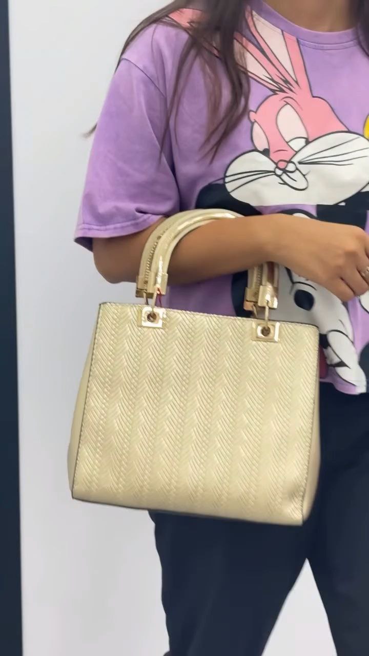 Elegant Gold Textured Handbag with Dual Handles - Image 3